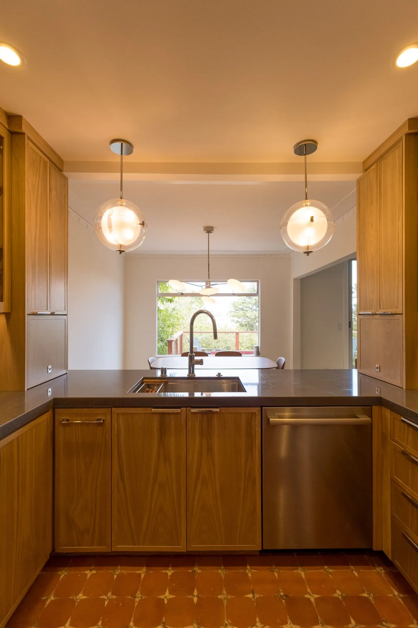 Rift oak kitchen sink wall with pendants