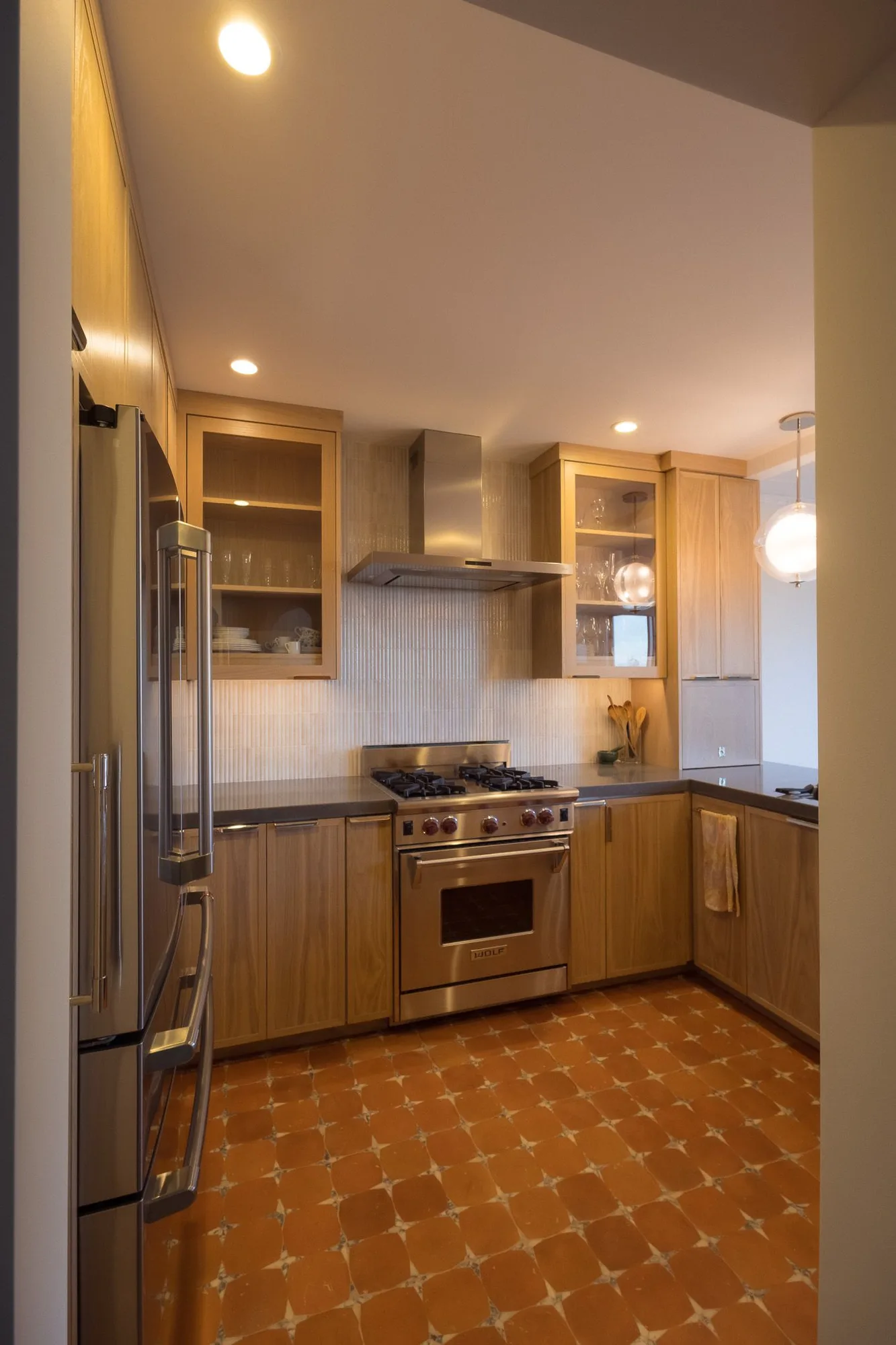 Oak kitchen, terracotta floor
