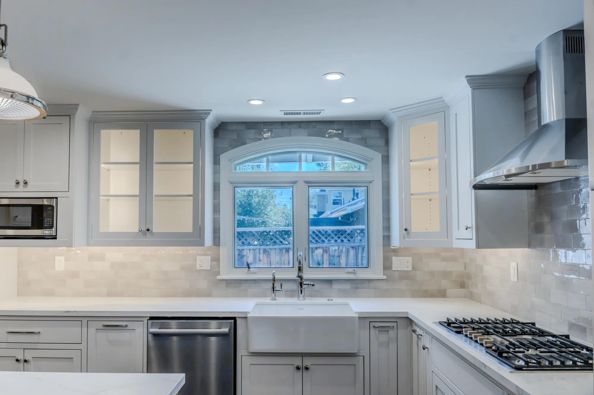 Farmhouse sink & arched window